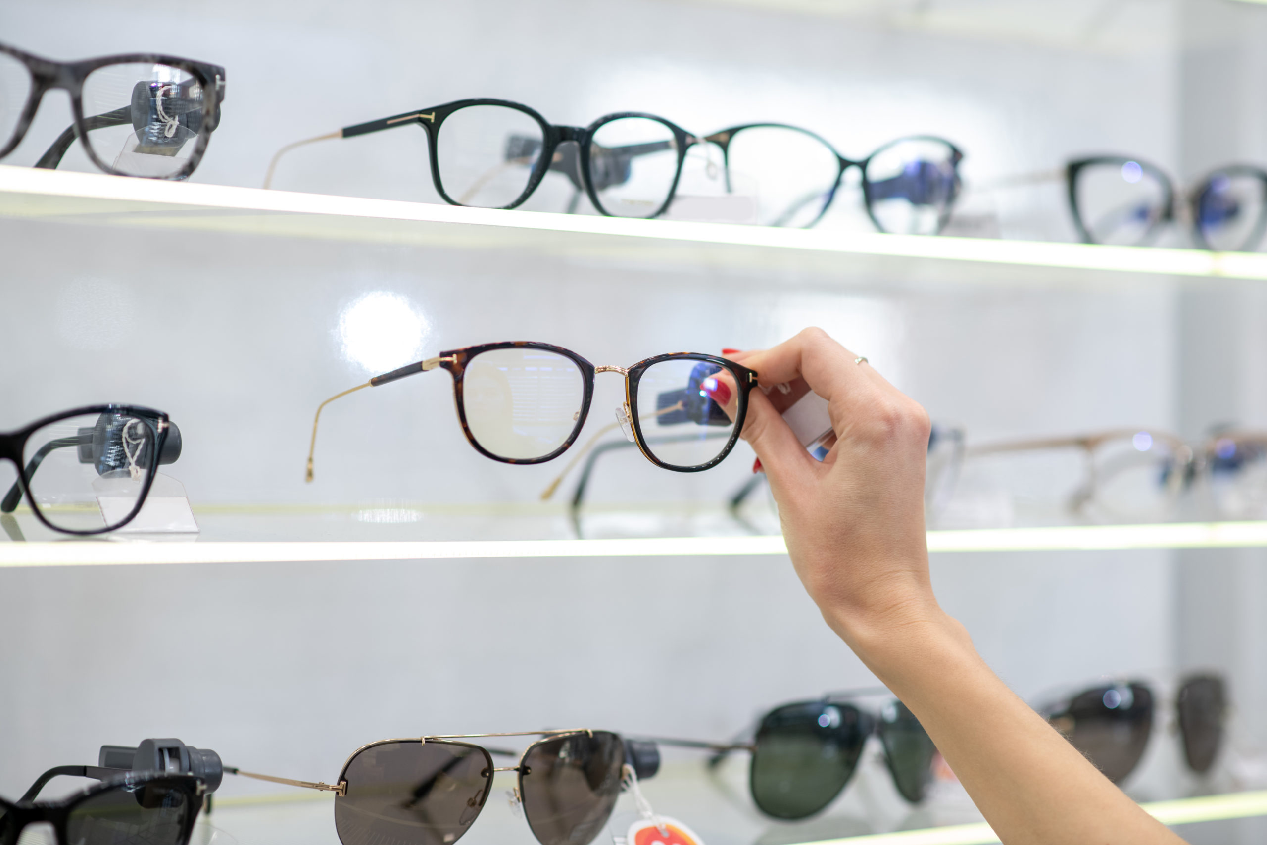 Eyeglasses on shelf display